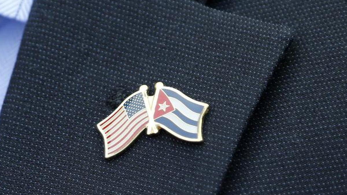 
The flag pin worn by a member of a U.S. Senate delegation in Havana, Cuba, Saturday, represents the two countries moving toward the reopening of embassies. 
