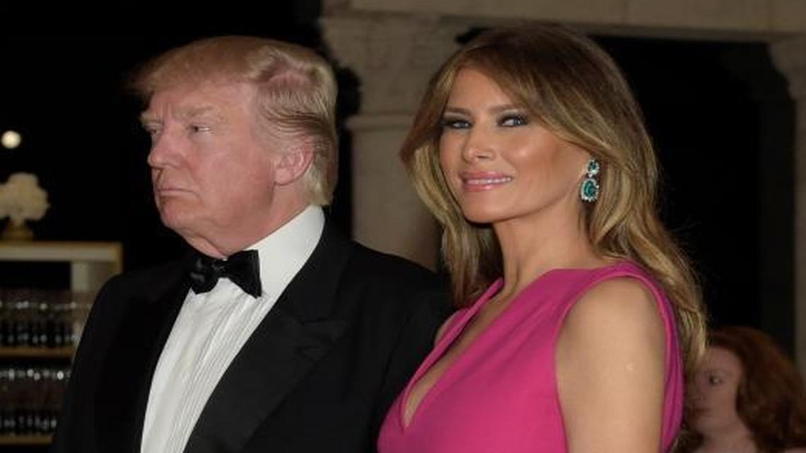 President Donald Trump and first lady Melania Trump arrive for the 60th annual Red Cross Gala at Trump's Mar-a-Lago resort in Palm Beach, Fla., on Saturday, Feb. 4, 2017.