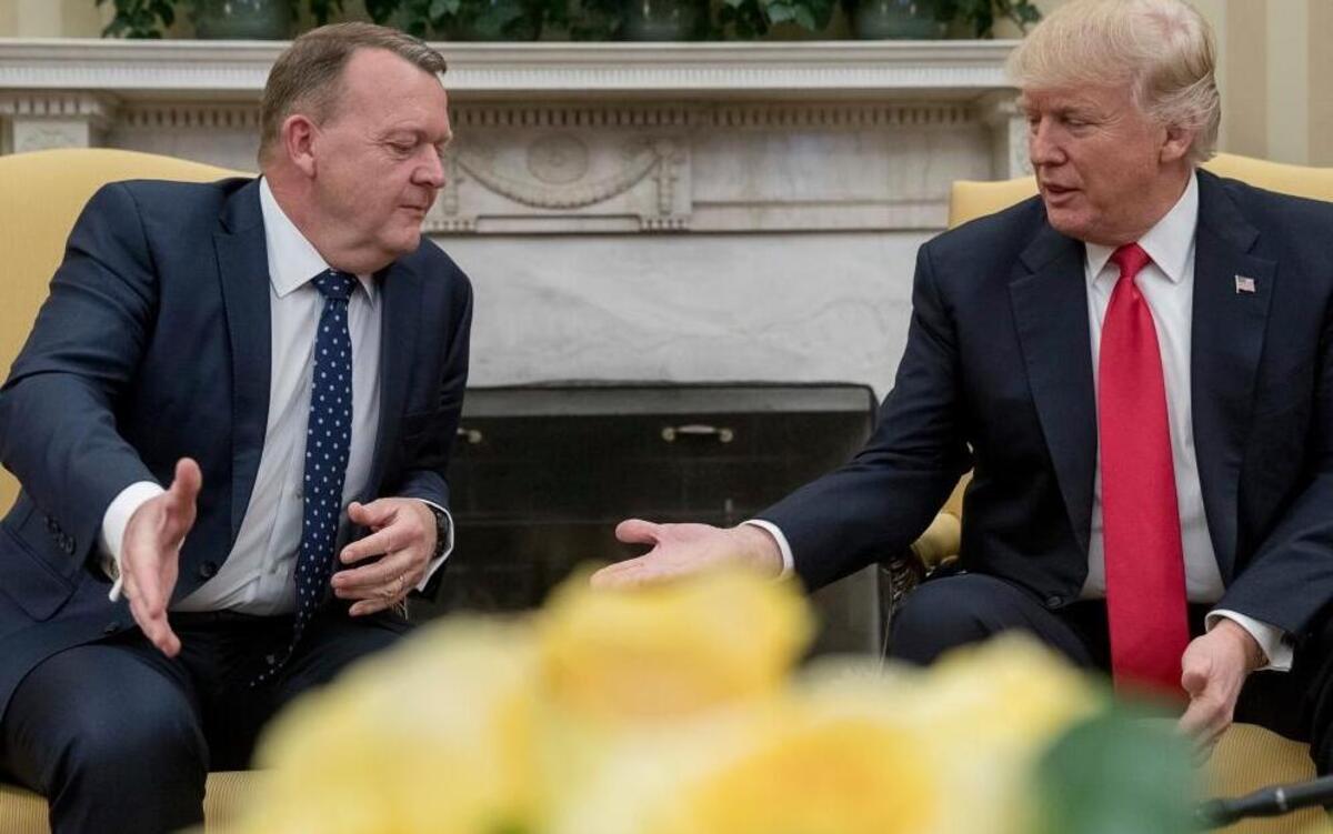 President Donald Trump and Danish Prime Minister Lars Lokke Rasmussen prepare to shake hands in the Oval Office at the White House in Washington, Thursday, March 30, 2017.