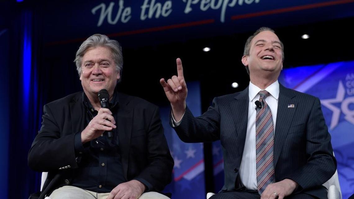 Former White House Chief of Staff Reince Priebus, right, accompanied by ex-White House strategist Stephen Bannon, speaks at the Conservative Political Action Conference (CPAC) in Oxon Hill, Md., Thursday, Feb. 23, 2017. Both men are now gone from the administration.