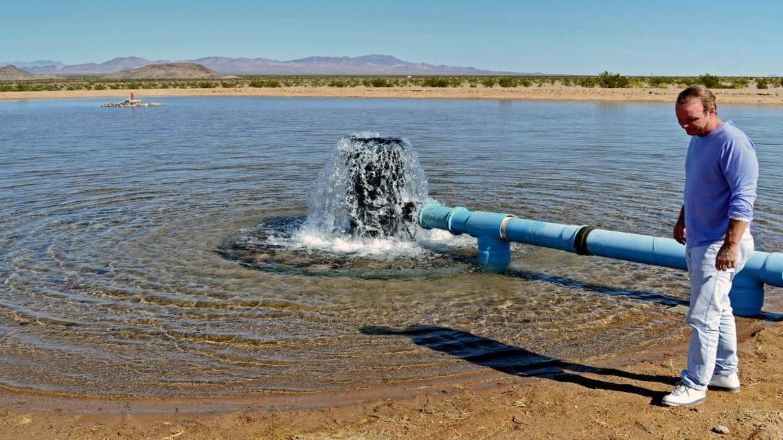 Scott Slater, CEO of the Cadiz water project, stands near a basin at the project site near Needles, California, Slater and Cadiz have recently gotten a big boost by a Trump administration decision that relieves the project of a federal environmental review requirement.