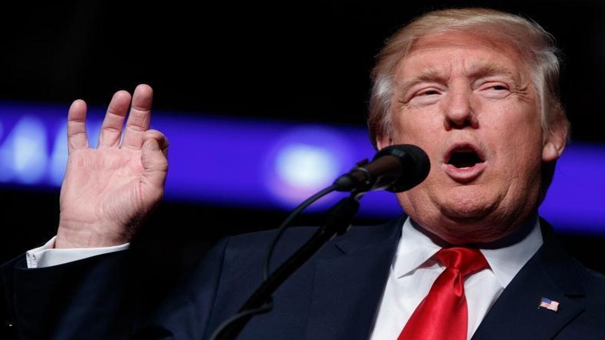 FILE - In this Dec. 15, 2016, file photo, President-elect Donald Trump speaks during a rally in Hershey, Pa.