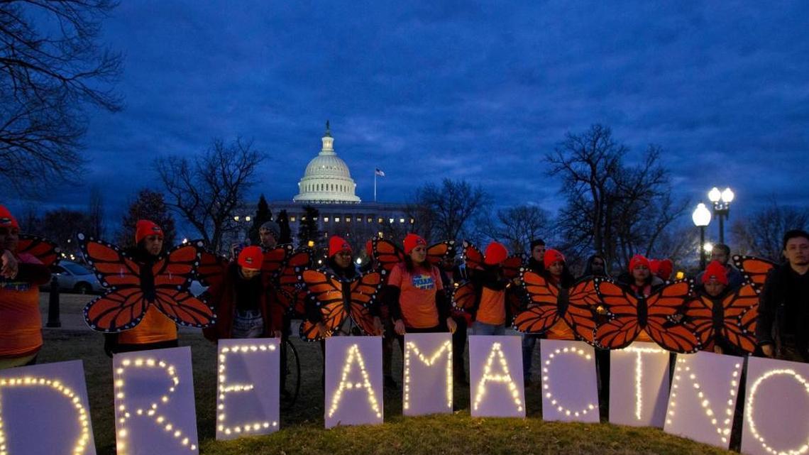 Demonstrators rally in support of Deferred Action for Childhood Arrivals (DACA) outside the Capitol, Sunday, Jan. 21, 2018, in Washington, on the second day of the federal shutdown. Democrats have been seeking a deal to protect the "Dreamers," who have been shielded against deportation by DACA, which President Donald Trump halted last year.