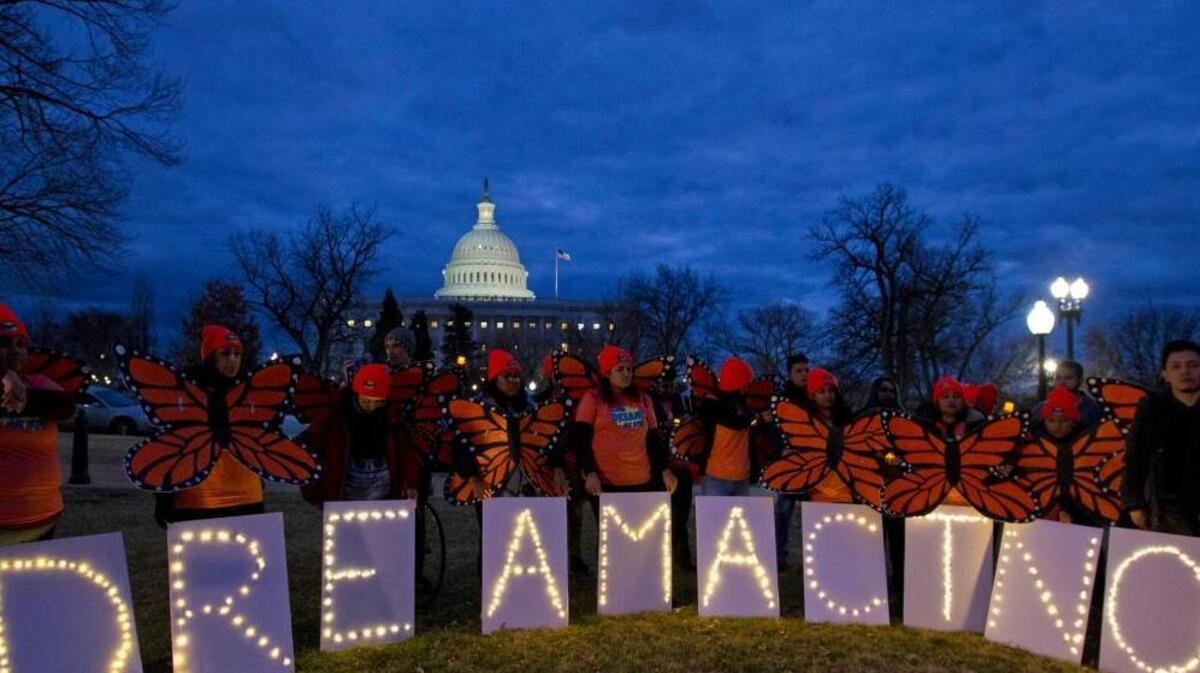 Demonstrators rally in support of Deferred Action for Childhood Arrivals (DACA) outside the Capitol, Sunday, Jan. 21, 2018, in Washington, on the second day of the federal shutdown. Democrats have been seeking a deal to protect the "Dreamers," who have been shielded against deportation by DACA, which President Donald Trump halted last year.