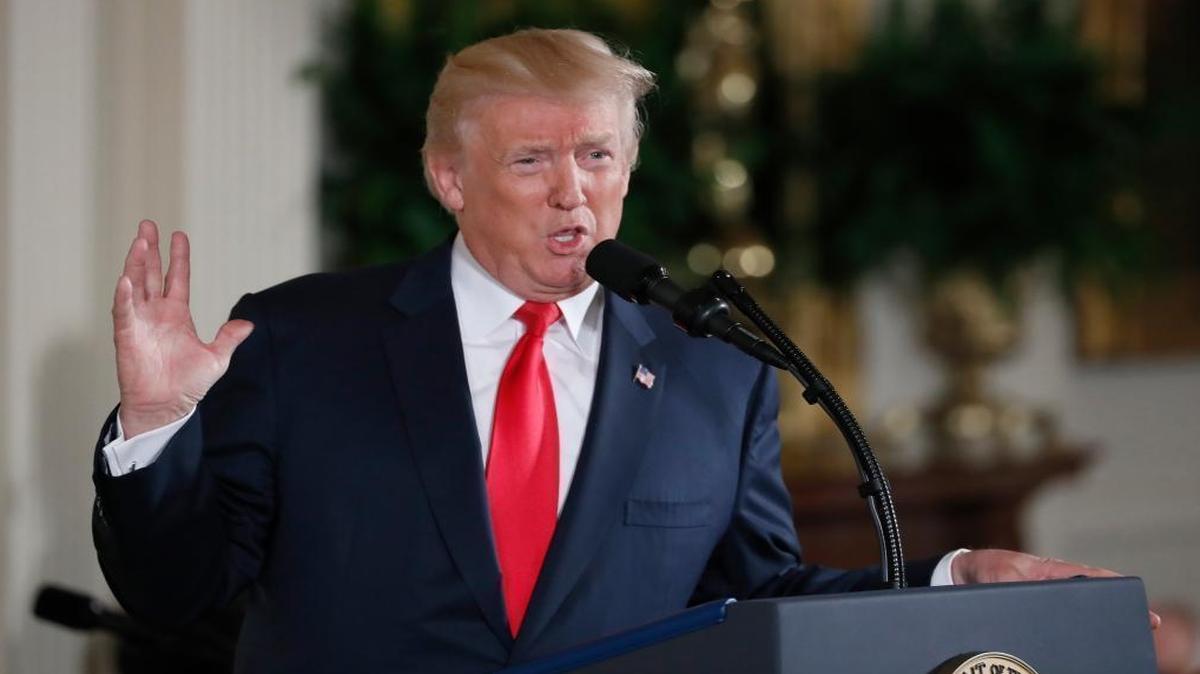 FILE - In this July 31, 2017 file photo, President Donald Trump speaks in the East Room of the White House in Washington. President Donald Trump plans to spend some time in New York while he takes a break from Washington.