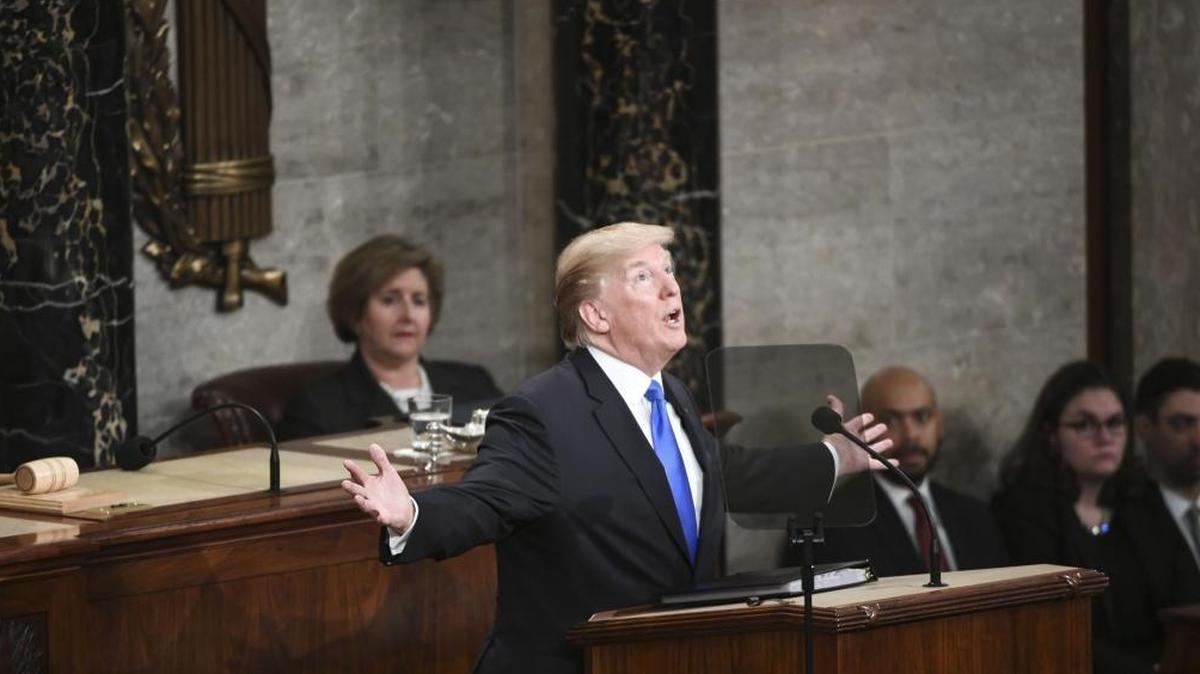 President Donald Trump gestures during his State of the Union speech in the House chamber of the U.S. Capitol on January 30, 2018 in Washington.