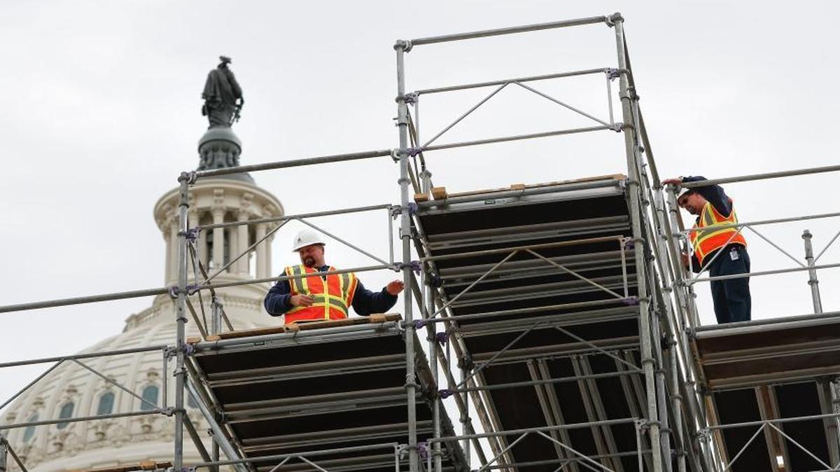 Construction continues on the inaugural platform in preparation for the inauguration and swearing-in ceremonies for President-elect Donald Trump, Dec. 8, 2016, on the Capitol steps in Washington. Trump will be sworn in as president on Friday.