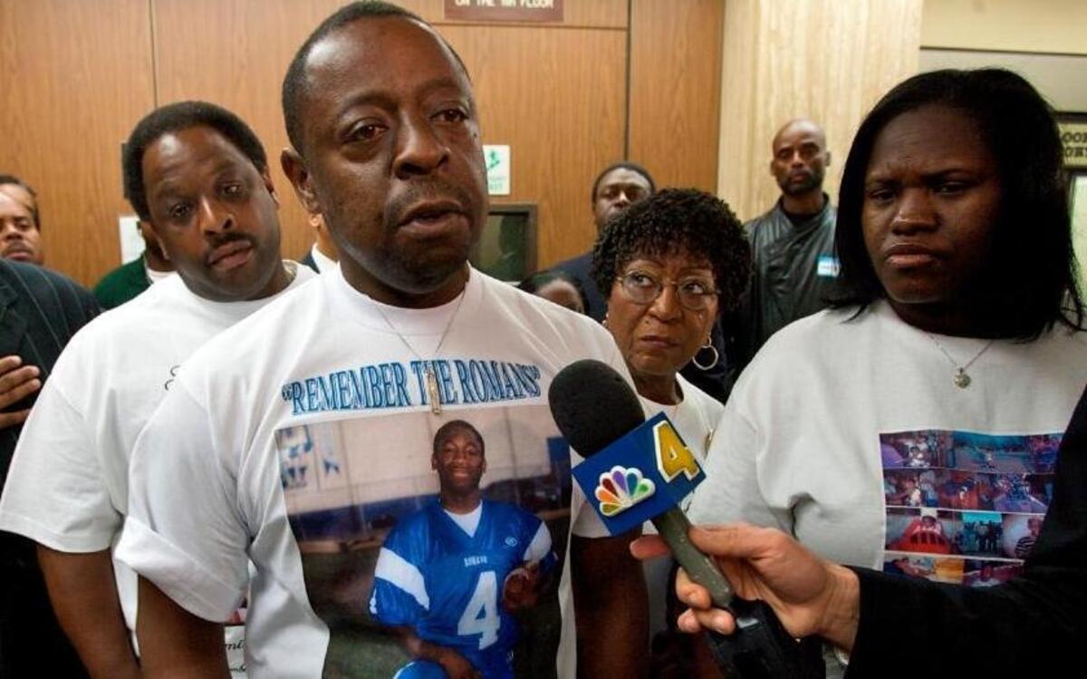 Jamiel Shaw Sr., center, and his wife, Army Sgt. Anita Shaw, far right, comment on the shooting death of their son Jamiel Shaw Jr., a 17-year-old Los Angeles High School football star. A 19-year-old reputed gang member who was in the country illegally was charged in the shooting.