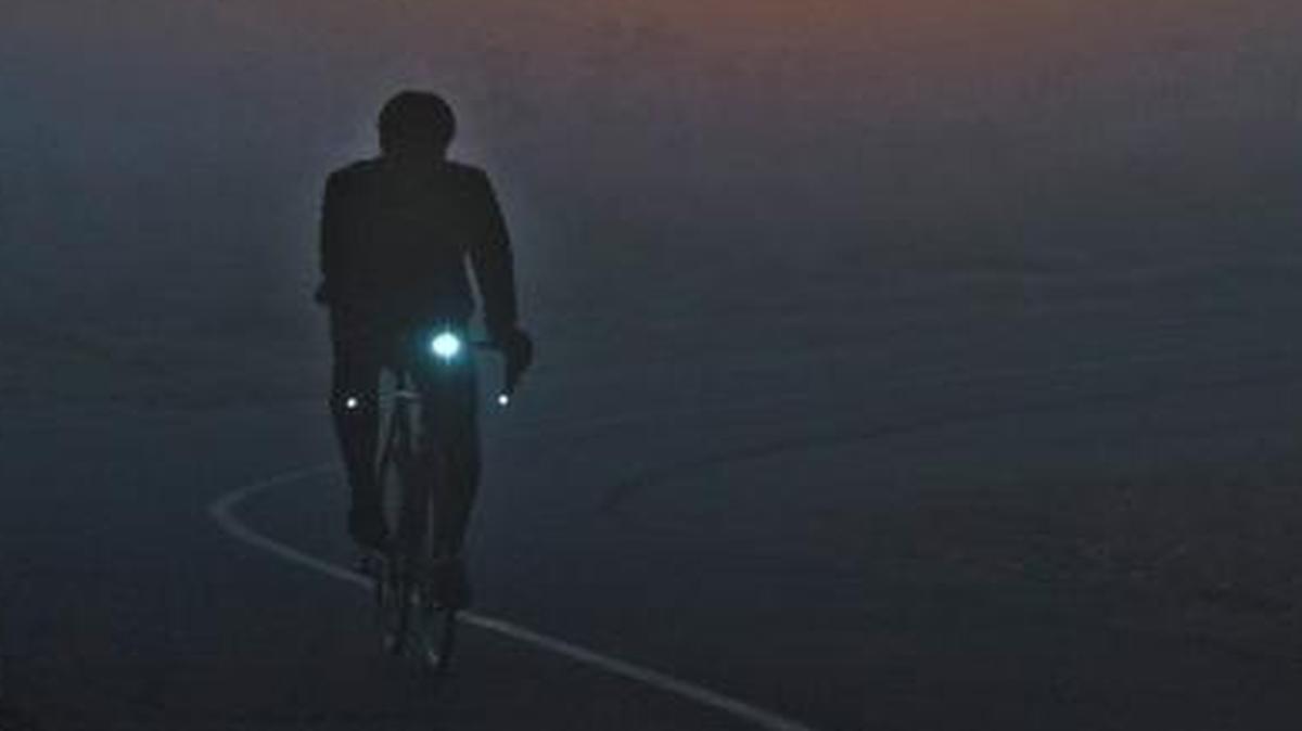 A cyclist on the American River Parkway bike trail at dawn. Several grants from the federal Land and Water Conservation Fund have helped create recreation facilities along the parkway, which runs between Sacramento and Folsom.