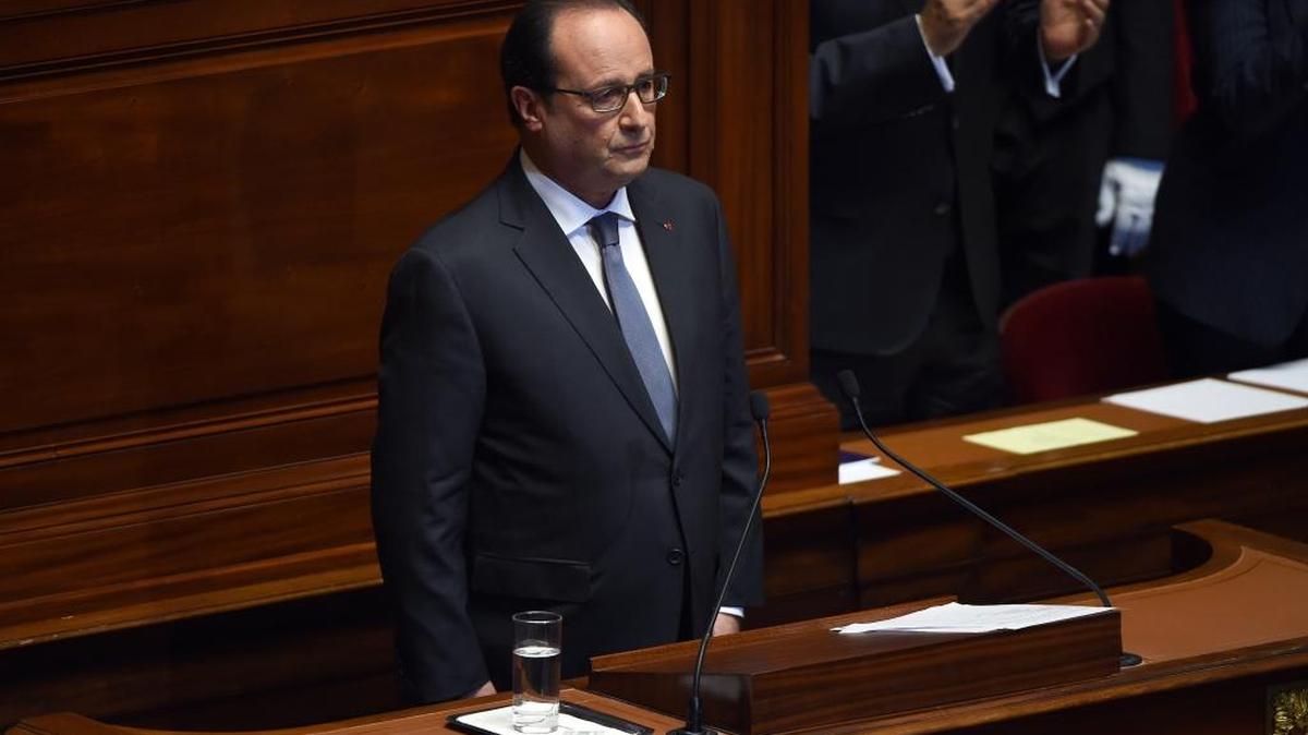 French President Francois Hollande looks on after delivering a speech at the Versailles castle, west of Paris, Monday, Nov.16, 2015. French President Francois Hollande is addressing parliament about France's response to the Paris attacks, in a rare speech to lawmakers gathered in the majestic congress room of the Palace of Versailles.