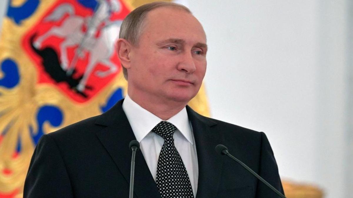 Russian President Vladimir Putin speaks at a reception marking Heroes of the Fatherland Day in the Kremlin in Moscow, Russia, Friday, Dec. 9, 2016. Heroes of the Fatherland Day is a holiday in tribute of the military.