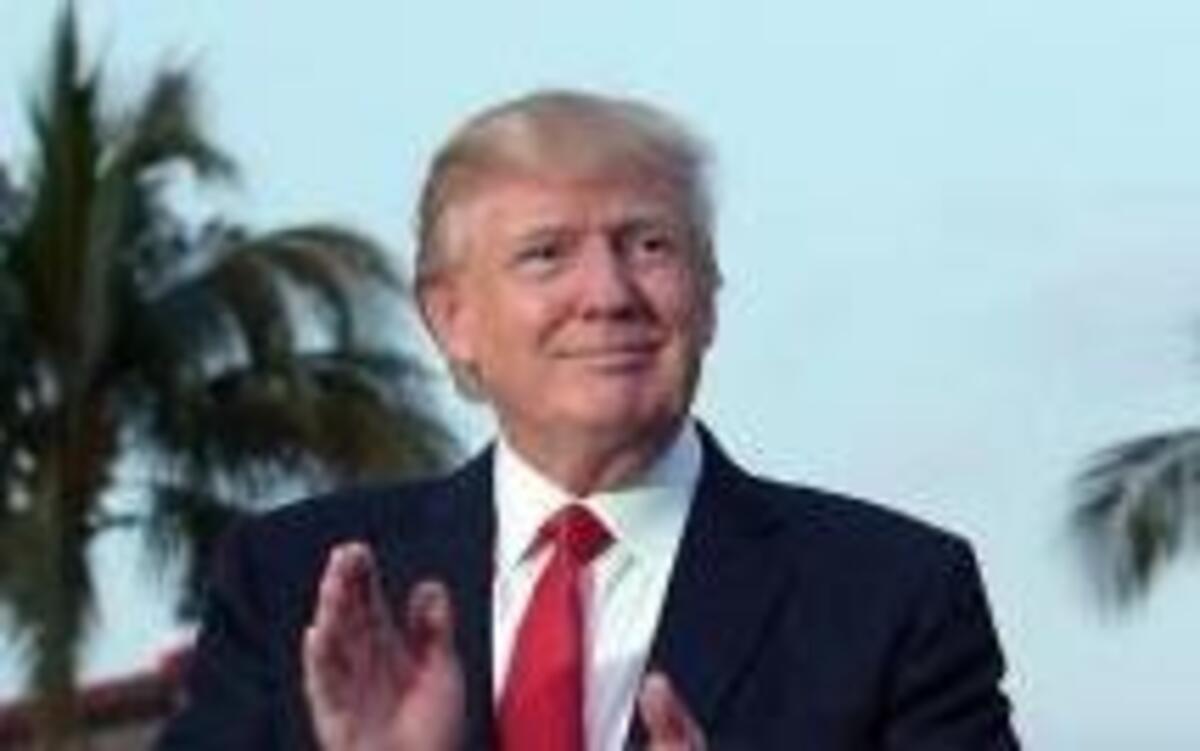 President Donald Trump was serenaded by the Palm Beach Central High School Band when he arrived at the Trump International Golf Club in West Palm Beach, Florida, on Sunday, Feb. 5, 2017. Japanese Prime Minister Shinzo Abe is expected to travel to Florida with Trump for a weekend stay and a round of golf.