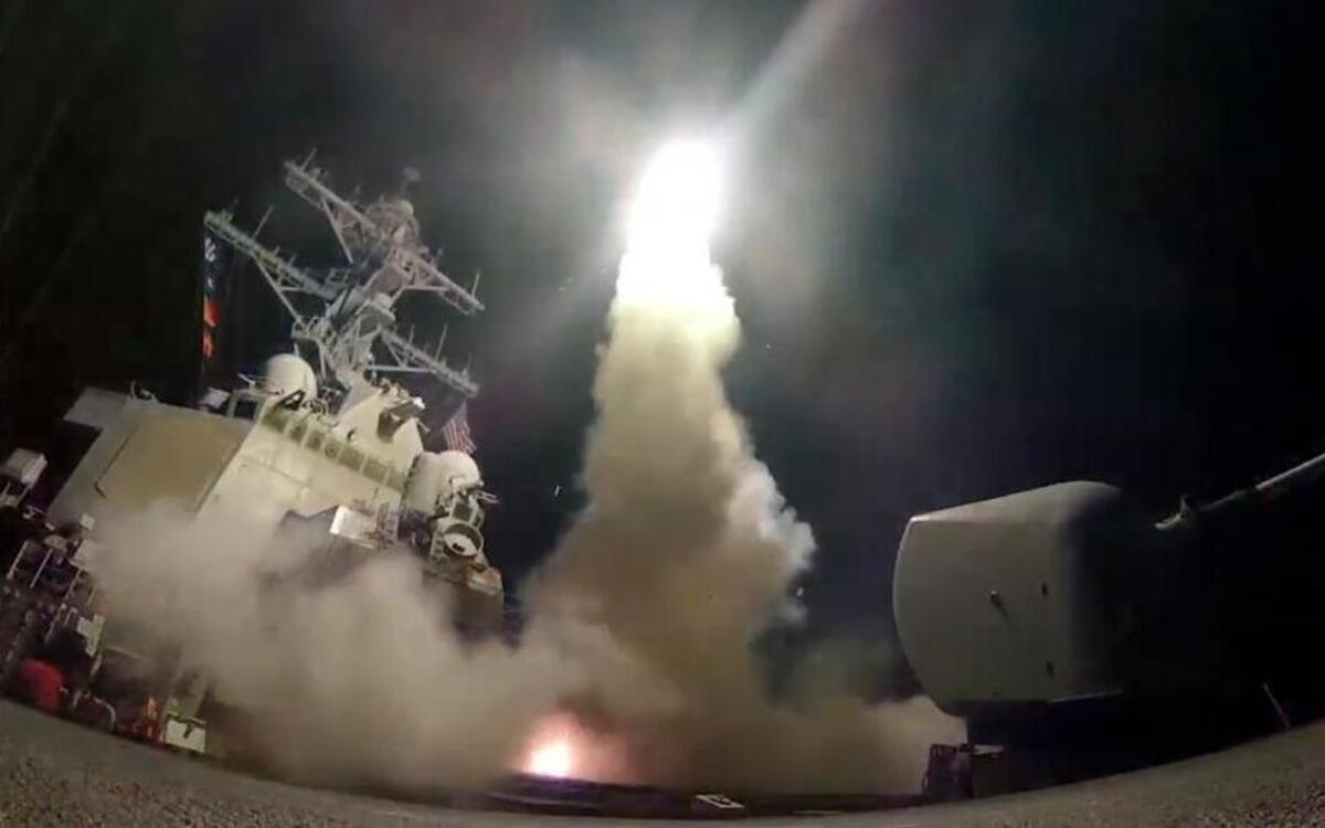 In this image from video provided by the U.S. Navy, the guided-missile destroyer USS Porter (DDG 78) launches a tomahawk land attack missile in the Mediterranean Sea, Friday, April 7, 2017.