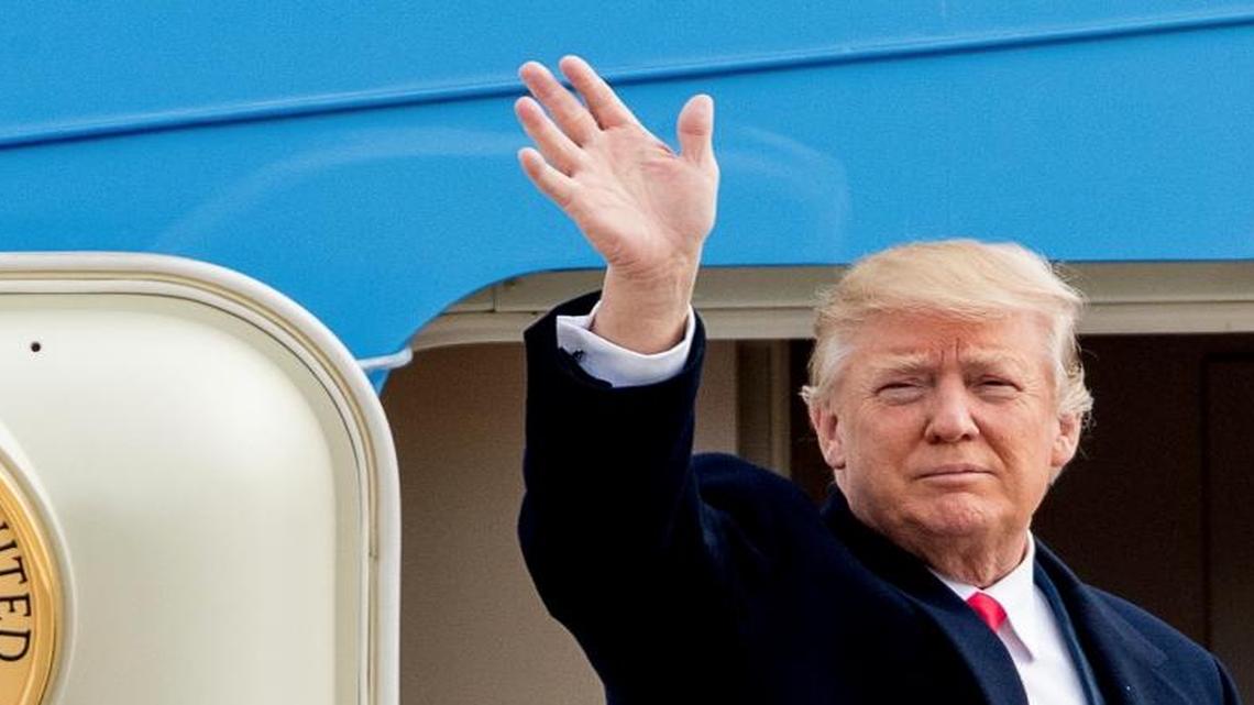 President Donald Trump waves before boarding Air Force One at Andrews Air Force Base in Maryland on Friday, Feb. 17, 2017.