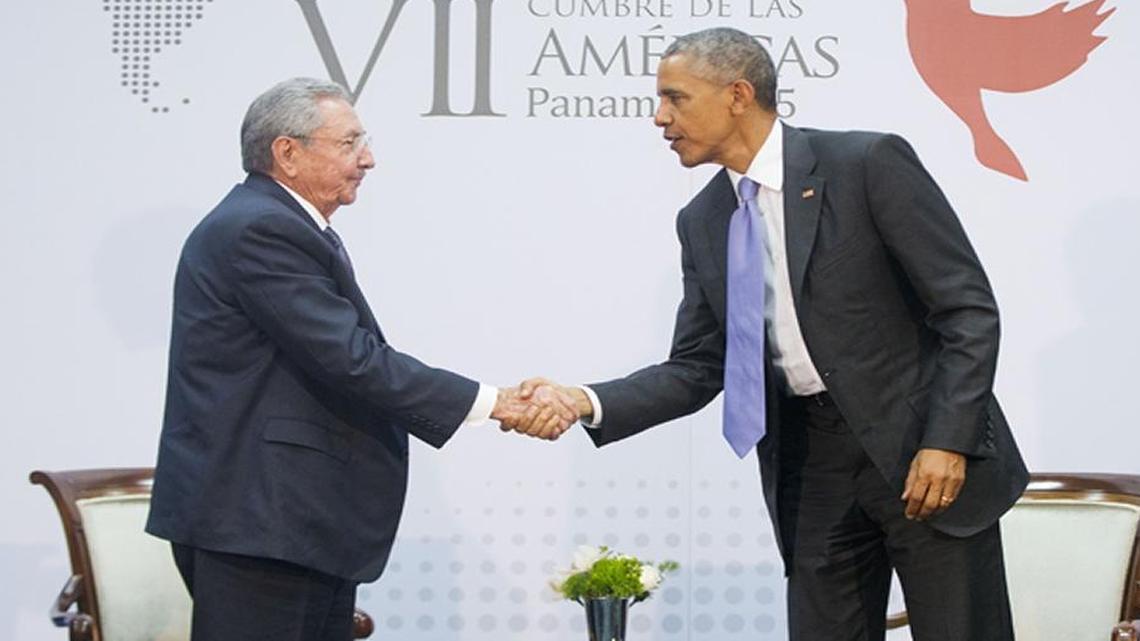 Barack Obama and Cuban President Raul Castro shook hands during their meeting at the Summit of the Americas in Panama City, Panama, in April 2015. Cuban officials recently have called on the United States to do more to discourage migration to the United States.