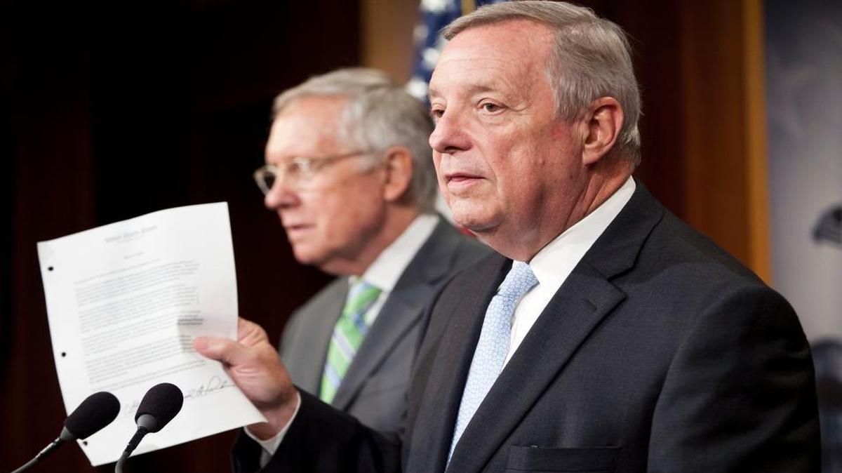 
Senate Minority Whip Richard Durbin of Ill., right, with Senate Minority Leader Harry Reid of Nevada, declare victory after Senate Democrats delivered a legacy-making victory on his top foreign policy priority. 
