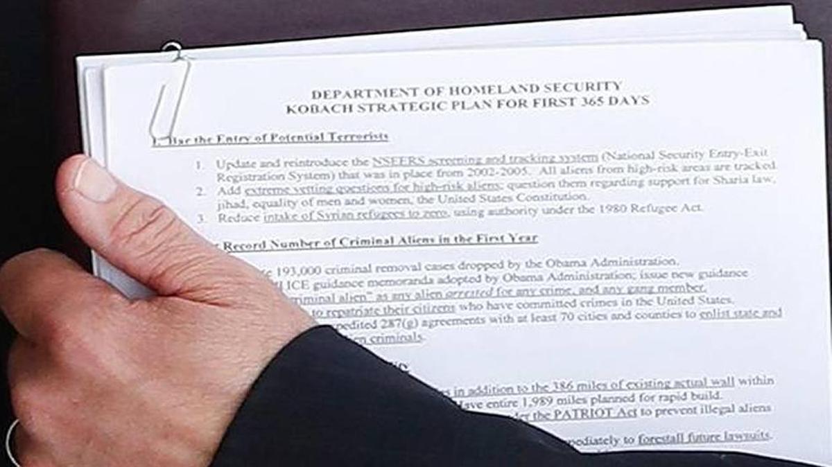 A photo of President-elect Donald Trump greeting Kansas Secretary of State Kris Kobach captured a proposal to “update and and reintroduce” the National Security Entry-Exit Registration System, which President Barack Obama suspended in 2011. On Thursday, the Obama administration officially dismantled the program, a move that will requires months of delay if the new Trump administration wants to re-establish it.