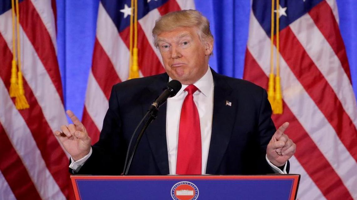 In this file photo dated Wednesday, Jan. 11, 2017, Donald Trump speaks during his first news conference as president-elect, in New York.