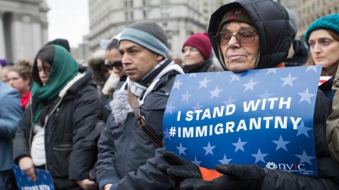 Demonstrators pray during Jummah, a Muslim Friday prayer service, in Foley Square, Jan. 27, 2017, in New York. The rally and prayer service sponsored by the New York Immigration Coalition and the Inter-Faith Clergy of New York City was in support of Muslims and immigrants.