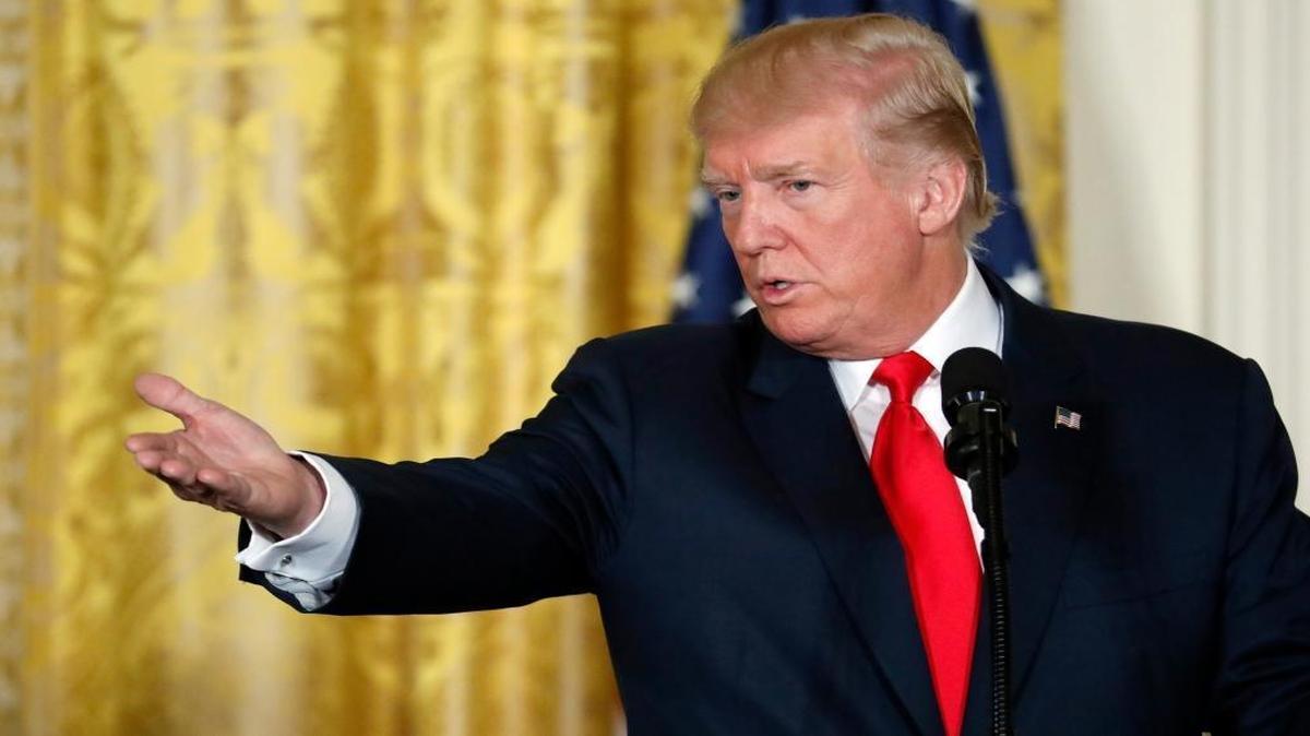 President Donald Trump gestures during a joint news conference with the Finnish President. Trump used the occassion to call the NAFTA agreement with Mexico and Canada one of the worst trade deals in history.