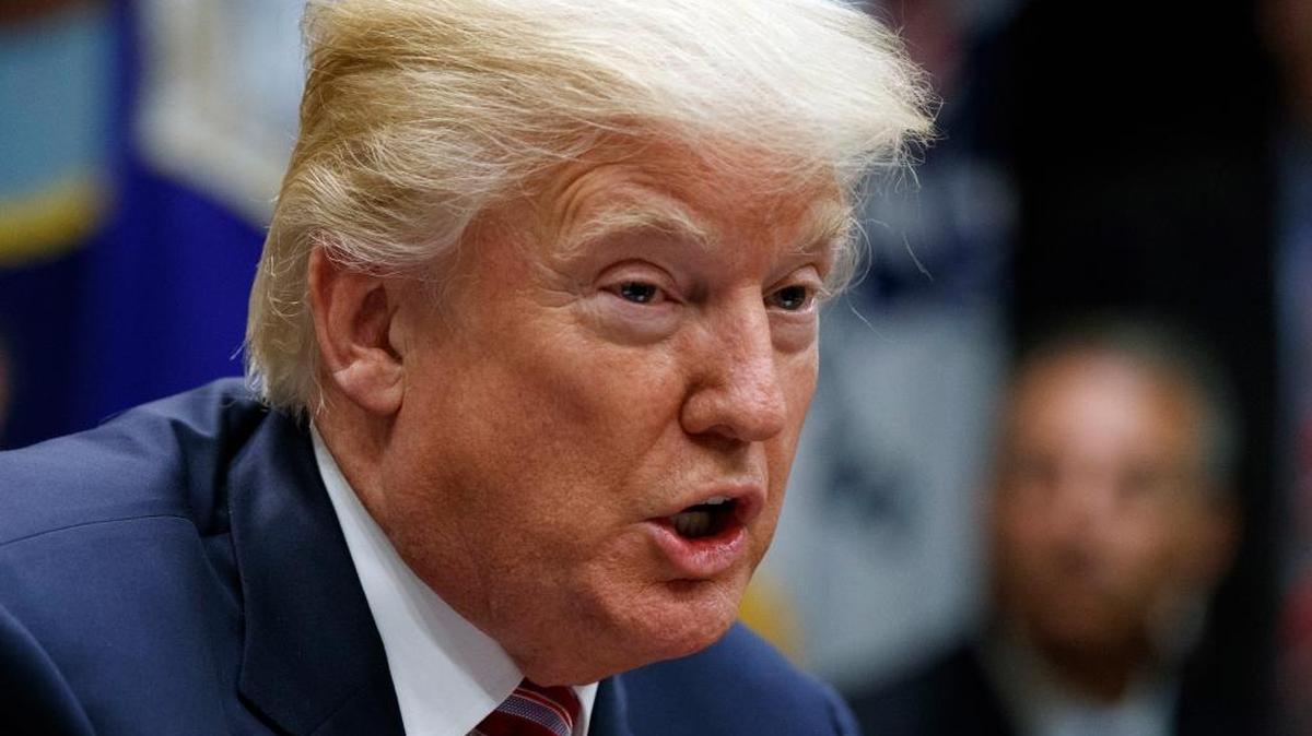 In this Tuesday, Oct. 31, 2017 photo, President Donald Trump speaks during a meeting in the Roosevelt Room of the White House in Washington. Trump is calling for â€œMerit Based immigrationâ€ following the truck attack in New York City that killed eight people and injured 11. Trump says on Twitter Wednesday that the driver in Tuesdayâ€™s attack â€œcame into our country through what is called the â€˜Diversity Visa Lottery Program,â€™ a Chuck Schumer beauty.â€