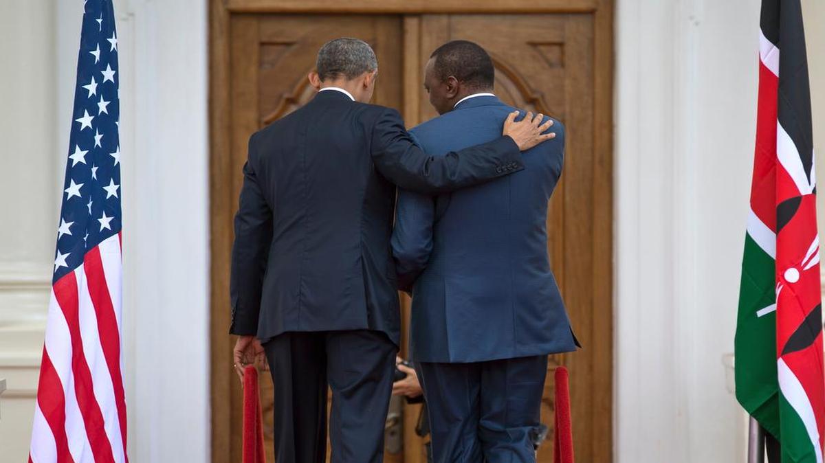 
President Barack Obama, left, puts his arm on the shoulder of Kenya's President Uhuru Kenyatta, right, as the two leave after speaking to the media at State House in Nairobi, Kenya Saturday, July 25, 2015. 
