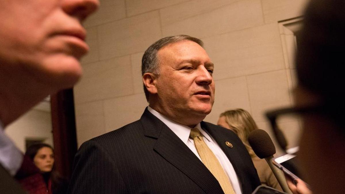House Benghazi Committee member Rep. Mike Pompeo, R-Kan., talks to reporters on Capitol Hill on Oct. 22, 2015, during a break in the committee's hearing.