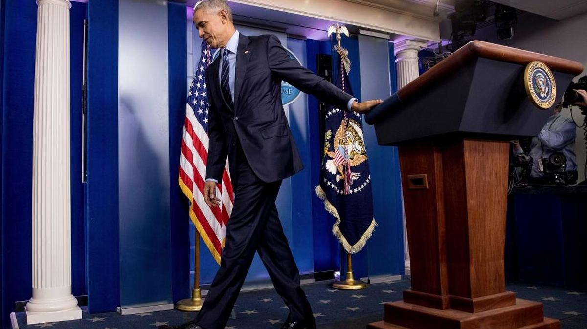 President Barack Obama leaves a news conference in the Brady press briefing room at the White House in Washington, Friday, Dec. 16, 2016.