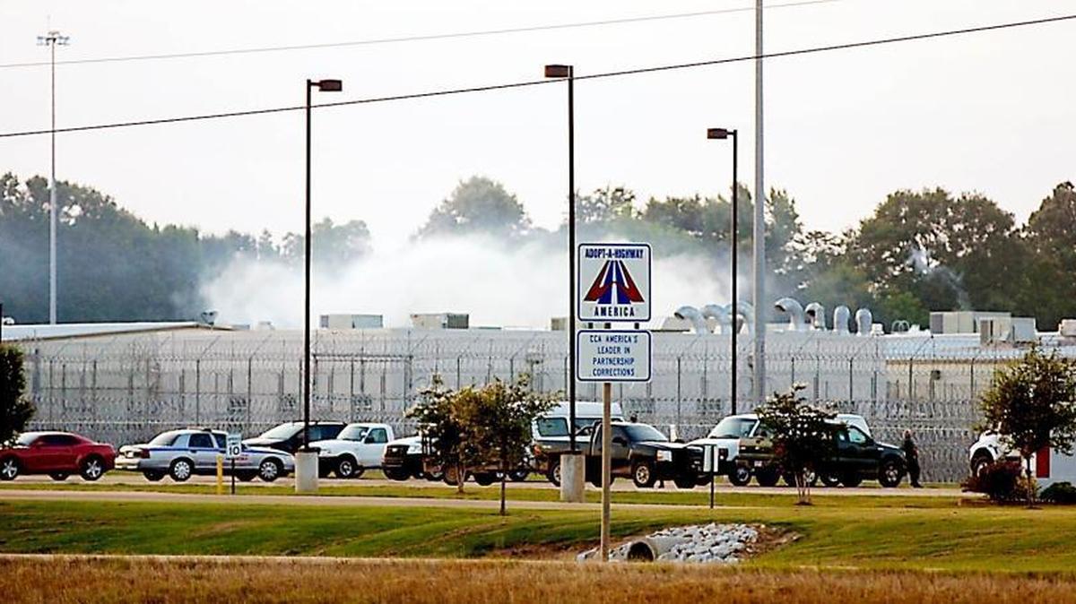 Smoke rises above the Adams County Correctional Center in Natchez, Miss., on May 20, 2012, during an inmate disturbance at the prison.