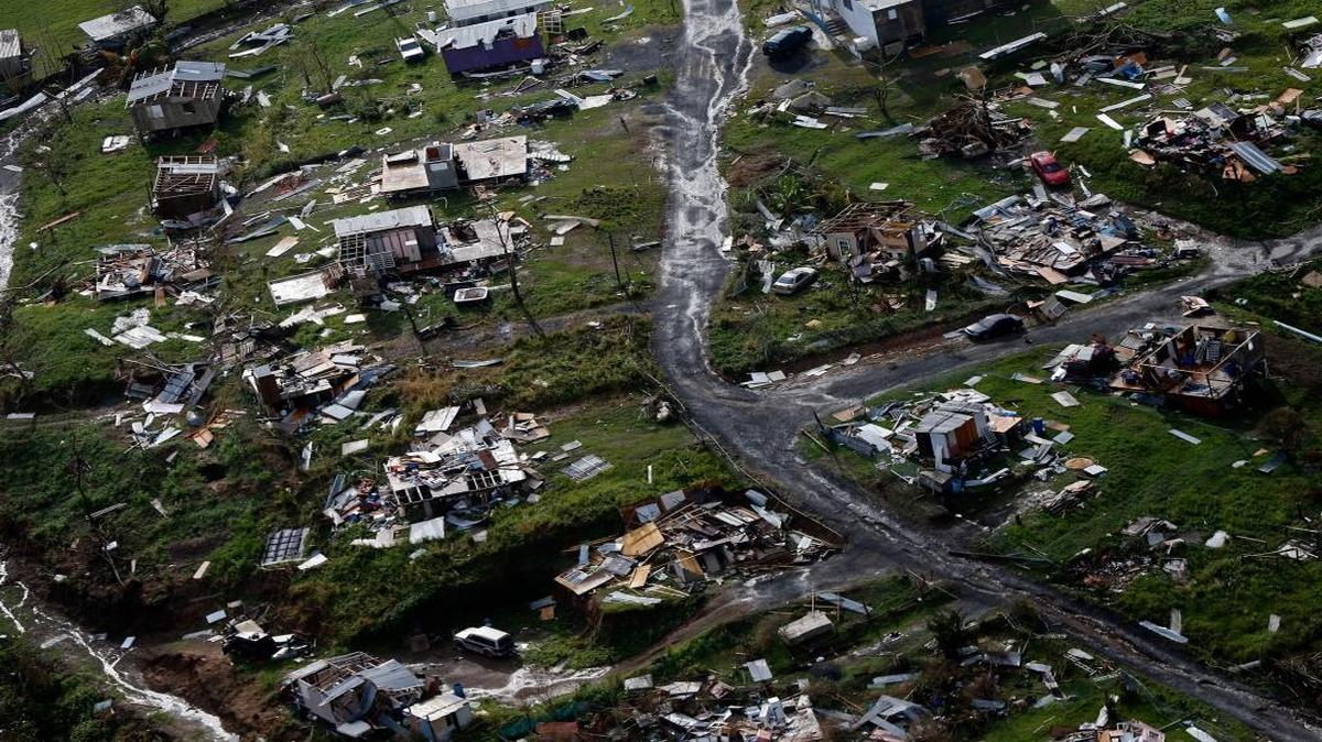 Destroyed communities are seen in the aftermath of Hurricane Maria in Toa Alta, Puerto Rico. Congress is on track to backing President Donald Trump's request for billions more in disaster aid.