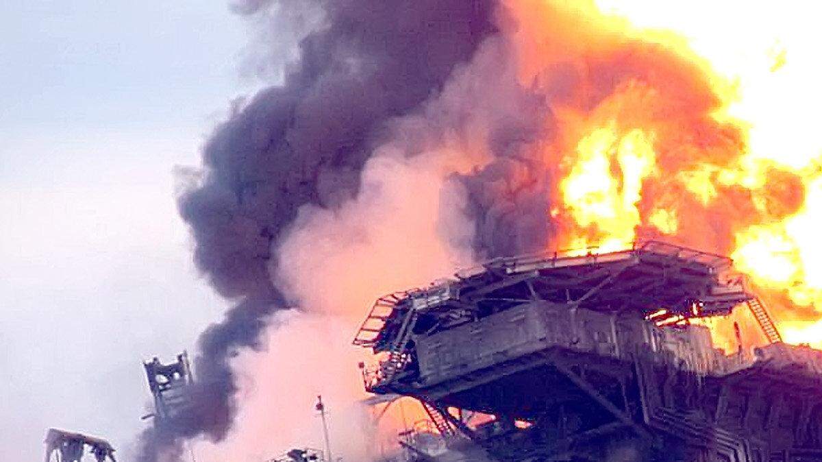 The offshore oil rig Deepwater Horizon burns in the Gulf of Mexico shortly before it sank April 22, 2010.