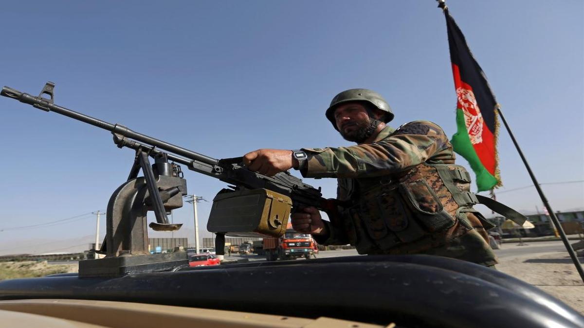 An Afghan National army soldier stands guard a checkpoint on the outskirts of Kabul, Afghanistan, Monday, Aug. 21, 2017. On Monday, President Donald Trump is planning to deliver his first formal address to the nation since taking office as he reveals to the nation his strategy for the war in Afghanistan.