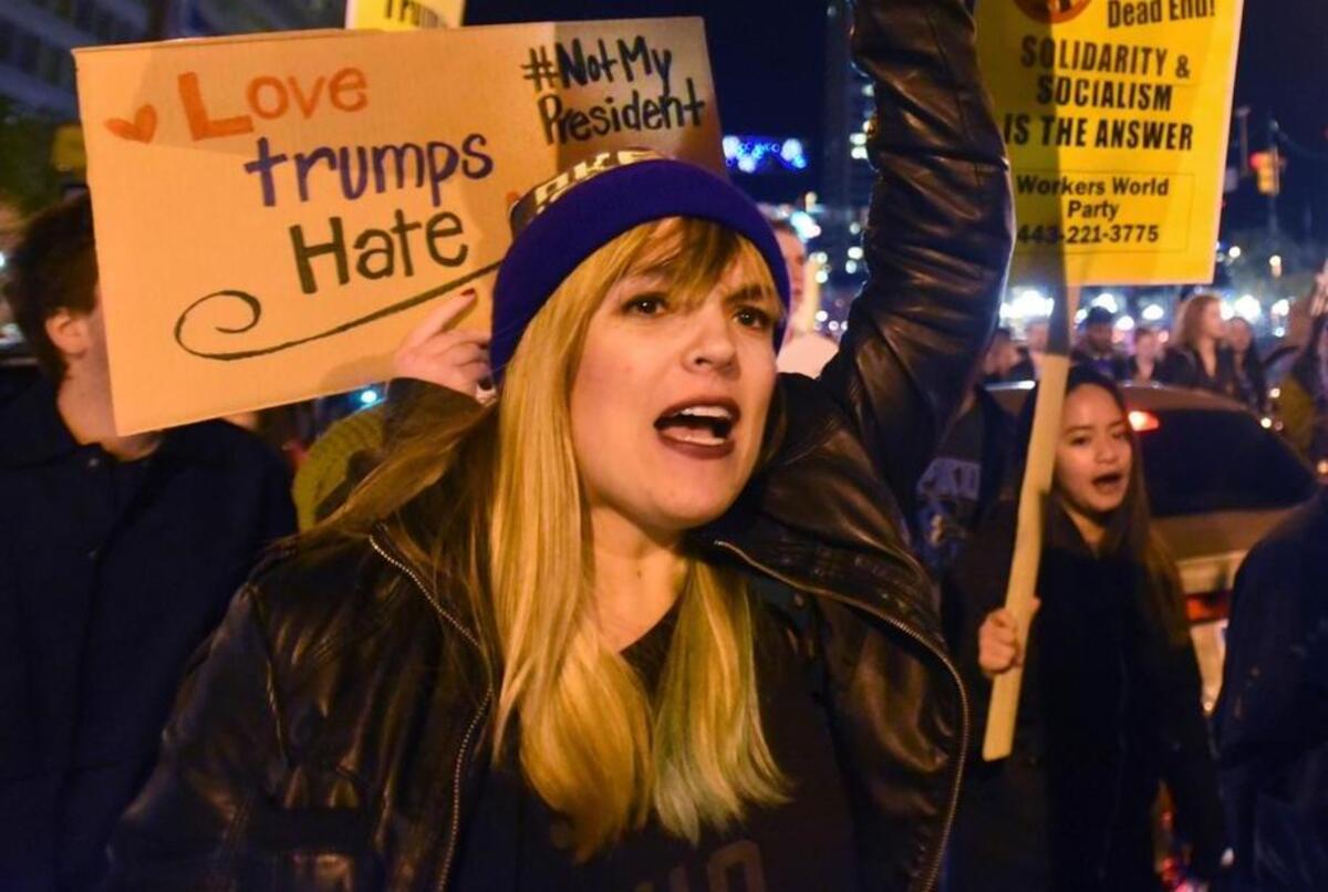 Anti-Trump protesters march from the Washington Monument to Inner Harbor Thursday, in Baltimore. Scattered protests around the country continue to follow the unexpected election of Donald Trump as president.