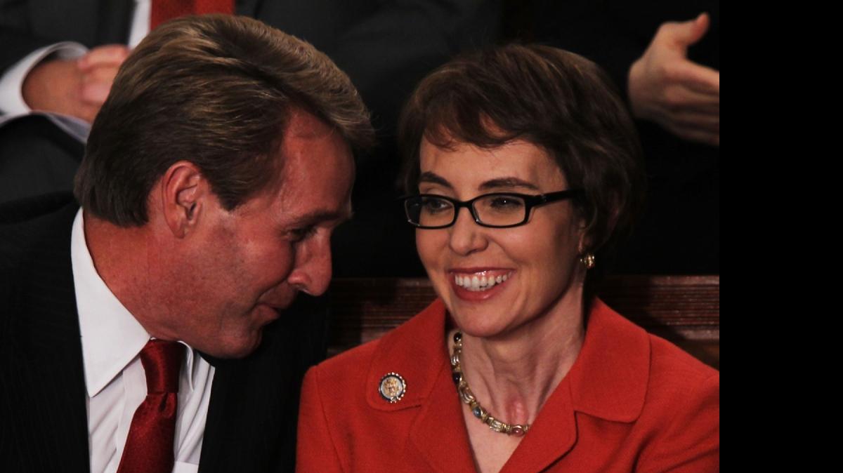 Republican Jeff Flake was criticized for the aid he gave Democratic U.S. Rep. Gabrielle Giffords.