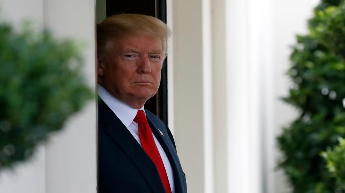 President Donald Trump awaits the arrival of Finnish President Sauli Niinisto Monday at the White House in Washington.
