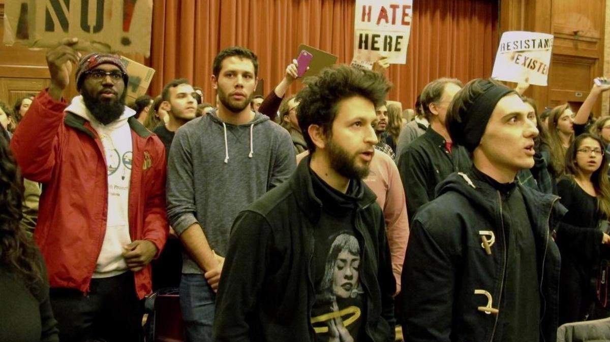 Middlebury College students turn their backs to Charles Murray, unseen, during his March 2 lecture.