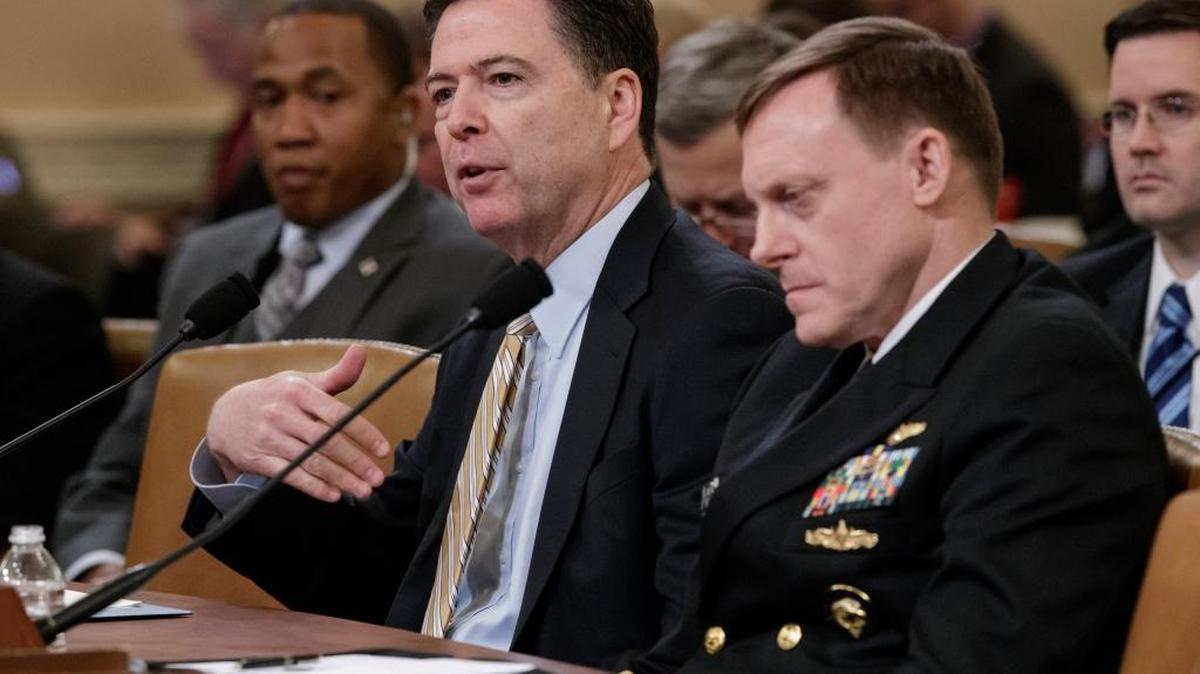 FBI Director James Comey, left, and National Security Agency Director Michael Rogers, testifies on before the House Intelligence Committee on allegations of Russian interference in the 2016 U.S. presidential election.
