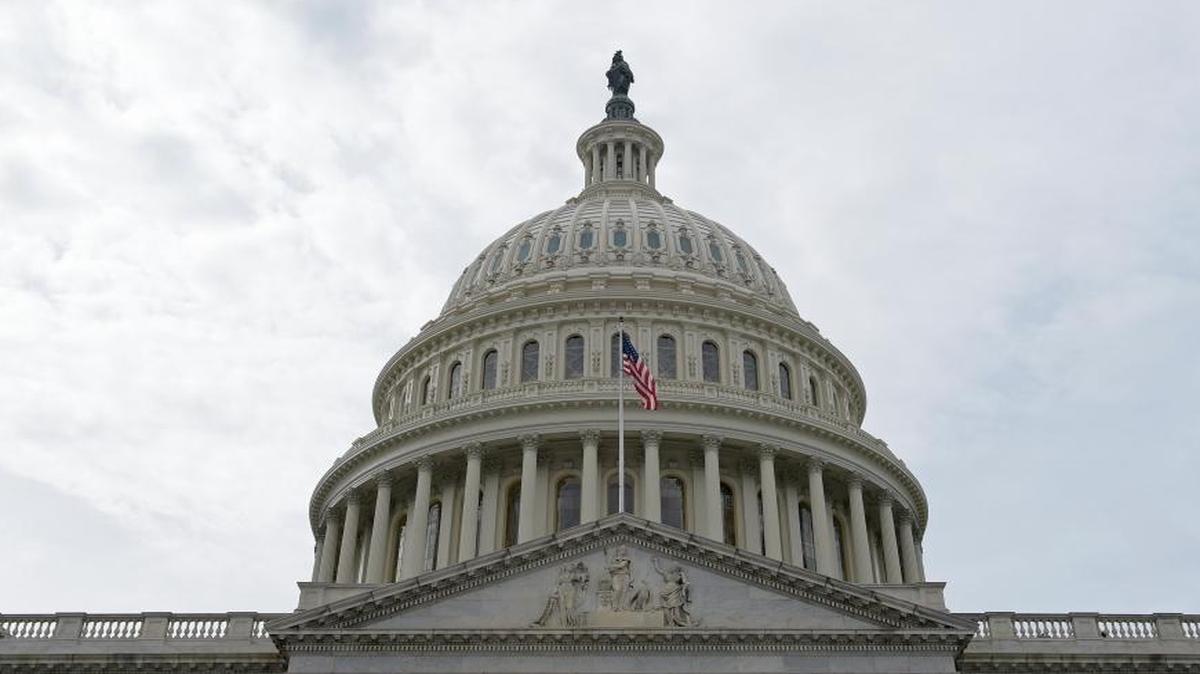 A flag flies on Capitol Hill in Washington, Feb. 28, 2017. Lawmakers returned to Washington this week to a familiar quagmire on health care legislation and a budget deadline dramatized by the prospect of a protracted battle between President Donald Trump and congressional Democrats over his border wall.