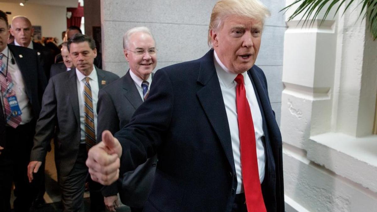 President Donald Trump, trailed by Health and Human Services Secretary Tom Price, arrives on Capitol Hill on Tuesday to rally support for the health care overhaul.