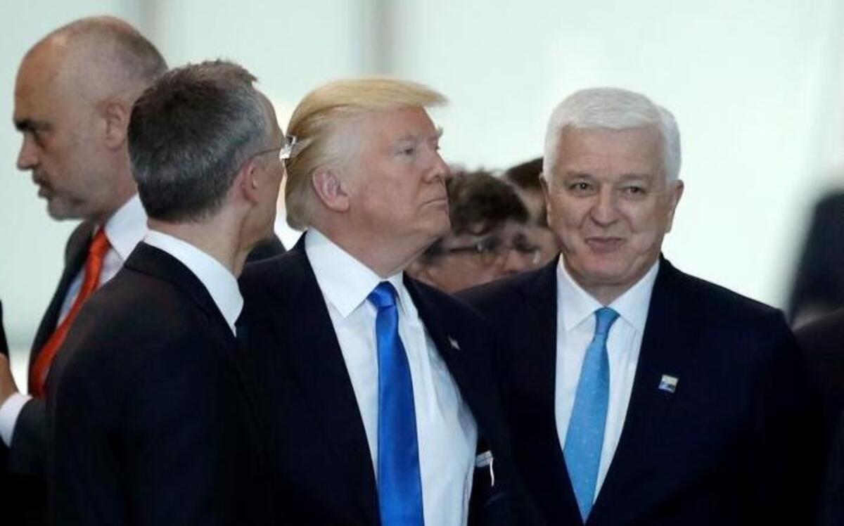 Montenegro Prime Minister Dusko Markovic, center right, after appearing to have been pushed by President Donald Trump, center, during a NATO summit of heads of state and government in Brussels on Thursday, May 25, 2017. Trump inaugurated the new headquarters during a ceremony Thursday with other heads of state and government.