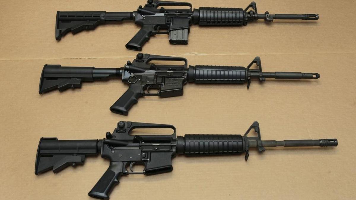 Three variations of the AR-15 assault rifle are displayed at the California Department of Justice in Sacramento.