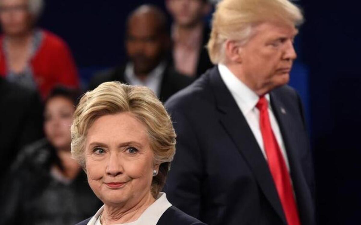 Democratic presidential nominee Hillary Clinton, left, and Republican presidential nominee Donald Trump during the second presidential debate at Washington University in St. Louis, Sunday, Oct. 9, 2016.