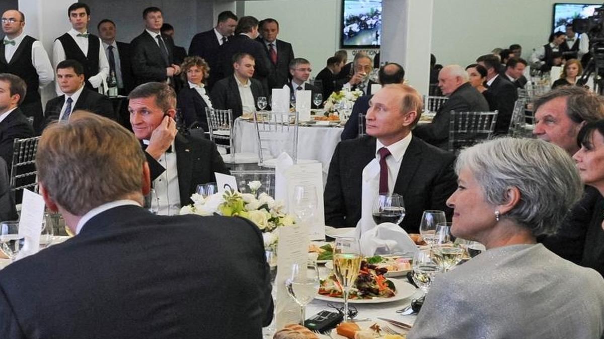 Russian President Vladimir Putin, center right, and retired Lt. Gen. Michael Flynn, center left, attend a Dec. 10 event in Moscow marking the 10th anniversary of RT (Russia Today), an English-language TV channel.