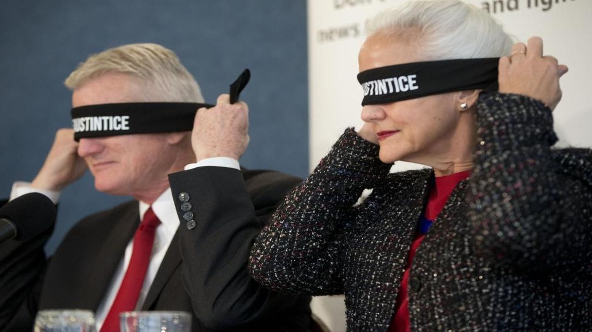 Debra and Marc Tice, the parents of missing journalist Austin Tice, blindfold themselves at a National Press Club event last year to raise awareness of their son’s abduction.