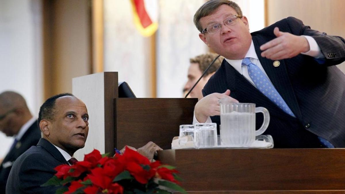 House Democratic leader Rep. Larry Hall, left, confers with Republican House Speaker Tim Moore, right, speaks with Democratic leader Larry Hall at the N.C. General Assembly this week.