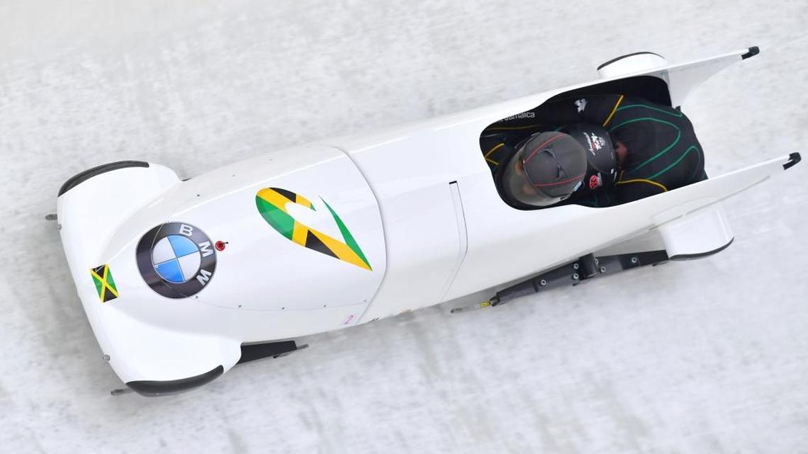 Jazmine Fenlator-Victorian and Carrie Russell of Jamaica speed down the track during their first run of the women's bobsled World Cup race in December.